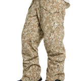 Burton Covert 2.0 2L Pants 2025 - A pair of tan snow pants with a camouflage pattern and black hardware.