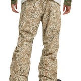 Burton Covert 2.0 2L Pants 2025 - A pair of khaki snow pants with a subtle green and white pattern, featuring black zippers on the side pockets.