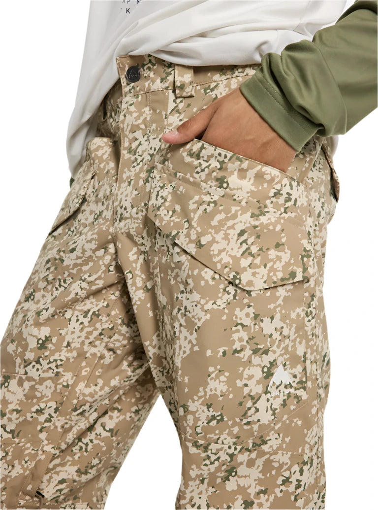 Burton Covert 2.0 2L Pants 2025 - A pair of khaki pants with a camouflage pattern and a small black button on the waistband.