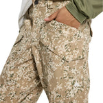 Burton Covert 2.0 2L Pants 2025 - A pair of khaki pants with a camouflage pattern and a small black button on the waistband.