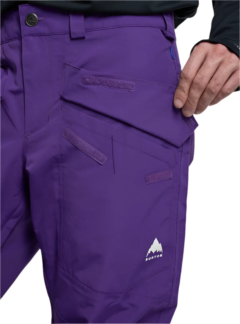 Burton Covert 2.0 2L Pants 2025 - A pair of purple ski pants with a white logo on the left leg featuring a mountain graphic and the word "BURTON" in bold letters.