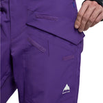 Burton Covert 2.0 2L Pants 2025 - A pair of purple ski pants with a white logo on the left leg featuring a mountain graphic and the word "BURTON" in bold letters.