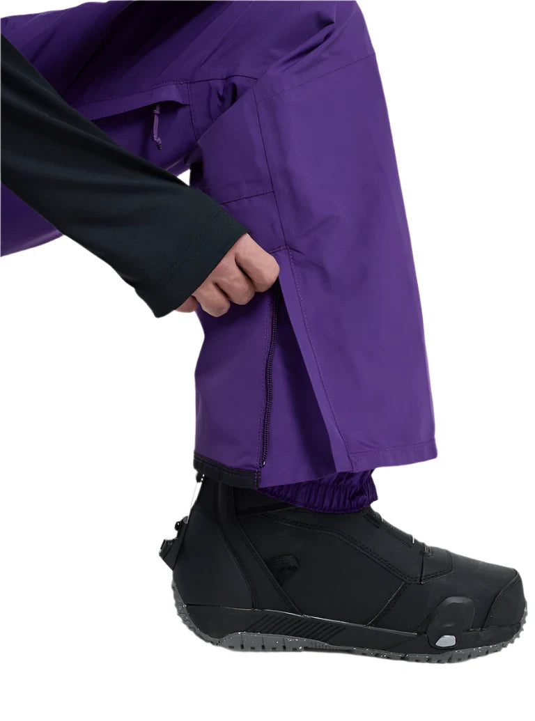 Burton Covert 2.0 2L Pants 2025 - Dark purple snow pants with a zippered pocket on the right thigh and adjustable Velcro straps at the ankles.