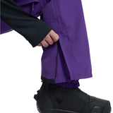 Burton Covert 2.0 2L Pants 2025 - Dark purple snow pants with a zippered pocket on the right thigh and adjustable Velcro straps at the ankles.