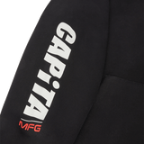 CAPiTA Dharma Hoodie 2026 - A black hoodie with a white logo on the chest and a small red tag on the left sleeve cuff.