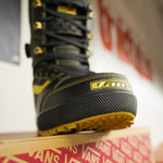Vans Invado Pro Limited Edition Snowboard Boots 2026 - Black snowboard boots with yellow accents and a textured rubber sole.