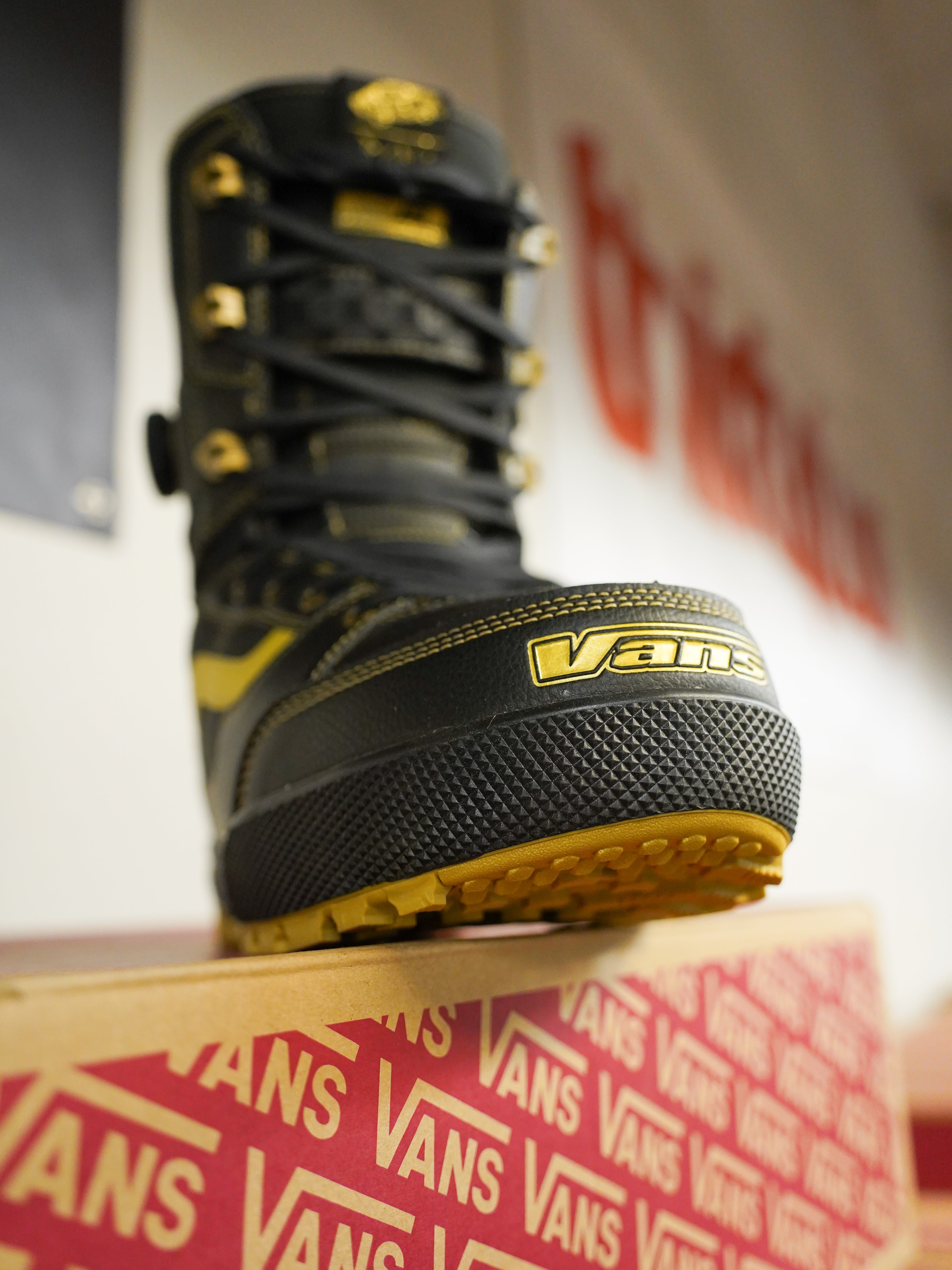 Vans Invado Pro Limited Edition Snowboard Boots 2026 - Black snowboard boots with yellow accents and a textured rubber sole.