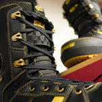 Vans Invado Pro Limited Edition Snowboard Boots 2026 - Black snowboard boots with yellow accents and gold buckles.