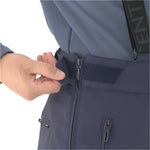 Descente Swiss Insulated Pant 2025 - A pair of navy blue insulated ski pants with a zippered pocket on the side.