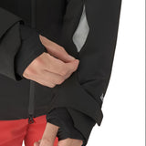Descente Steep Insulated Jacket 2025 - A black jacket with a white zipper and two zippered pockets on either side of the waist.