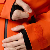 Descente Cody Insulated Jacket 2025 - A bright orange jacket with a black zipper and two zippered pockets on either side.