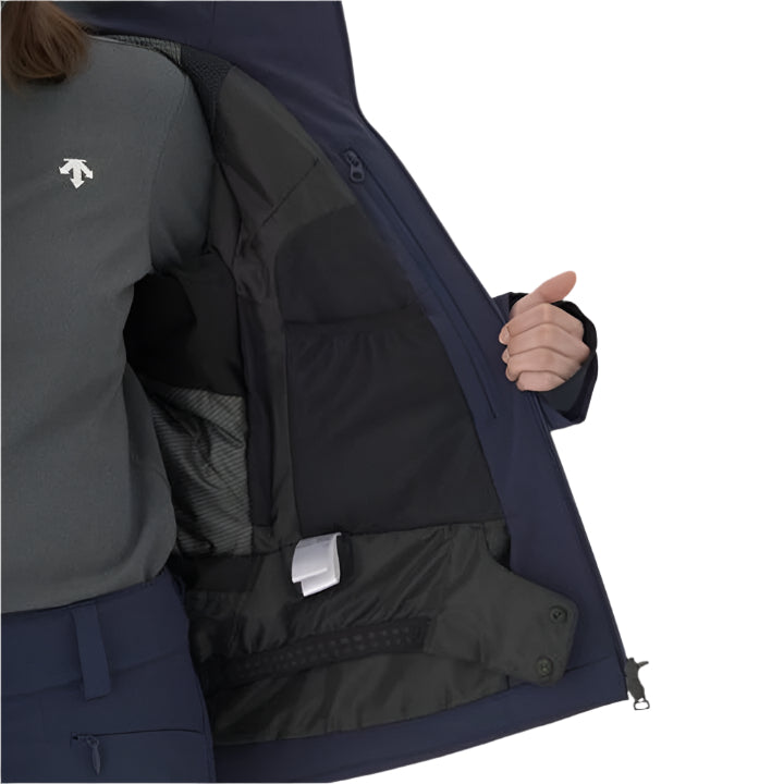 Descente Women's Swiss Insulated Jacket 2025 - A dark blue jacket with a white logo on the left chest area, featuring a zipper and two pockets at the front.