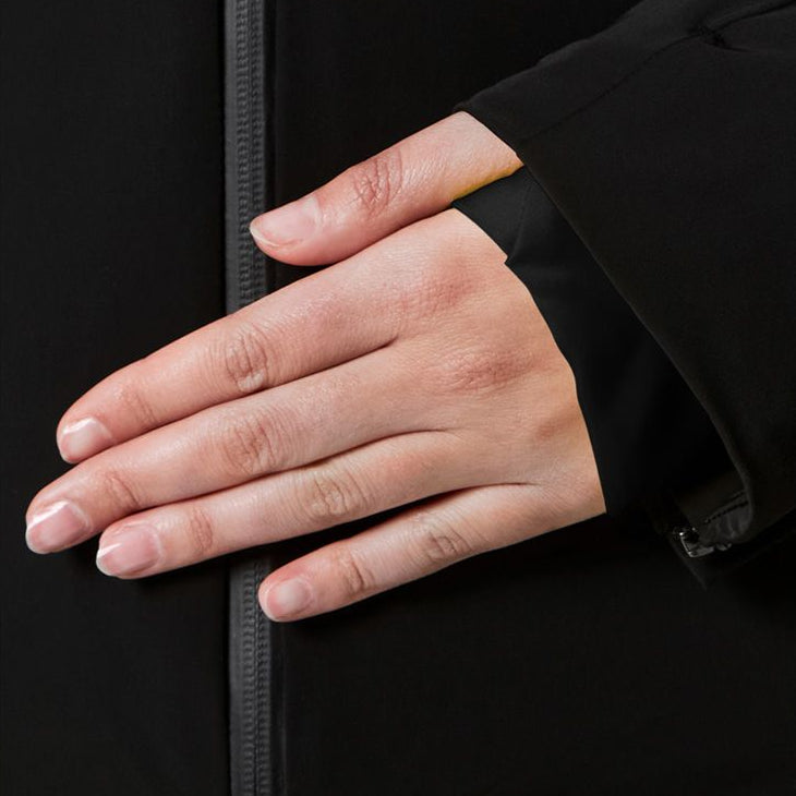 Descente Women's Kelly Insulated Jacket - A black insulated jacket with a zippered front and two pockets on either side, featuring a white logo on the left chest.