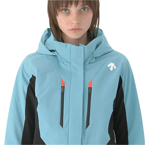 Descente Women's Lisa Insulated Jacket 2025 - A light blue jacket with a hood, featuring two zippered pockets on the front and an orange zipper pull.