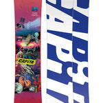 CAPiTA - Junior's Children Of The Gnar Snowboard 2025 is a pink snowboard with a colorful graphic of a monster and mountains on it.