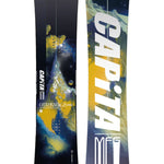 CAPiTA Outerspace Living Snowboard 2025 - A snowboard with a predominantly black background and yellow, blue, and white abstract design.