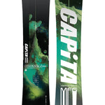 CAPiTA Outerspace Living Snowboard 2025 - A snowboard with a green and black design featuring a mountain range and stars in space.