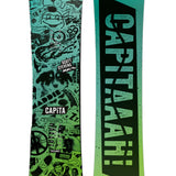 CAPiTA - Junior's Scott Stevens Mini Snowboard 2025 is a green snowboard with black graphics of various shapes and sizes, including what appears to be a cartoon character.