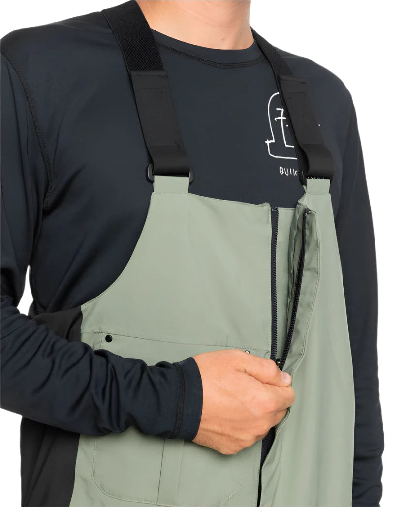 Quiksilver Utility Shell Bib 2025 - A pair of olive green snow pants with a zippered front and adjustable straps.