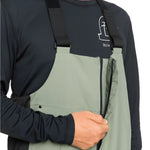 Quiksilver Utility Shell Bib 2025 - A pair of olive green snow pants with a zippered front and adjustable straps.