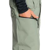 Quiksilver Utility Shell Bib 2025 - Sage green bib with multiple pockets and a black zipper on the right side.