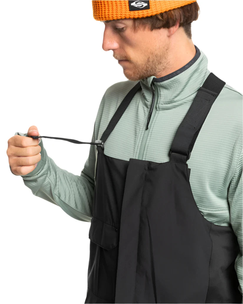 Quiksilver Utility Shell Bib - A black bib with a zippered front, adjustable straps, and two side pockets.