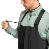 Quiksilver Utility Shell Bib - A black bib with a zippered front, adjustable straps, and two side pockets.