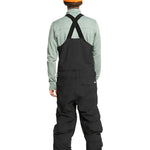 Quiksilver Utility Shell Bib - A black bib-style snow pant with a utility design, featuring multiple pockets and buckles on the side.