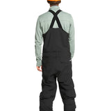 Quiksilver Utility Shell Bib - A black bib-style snow pant with a utility design, featuring multiple pockets and buckles on the side.