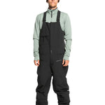 Quiksilver Utility Shell Bib - A black bib-style snow pant with a utility design, featuring multiple pockets and buckles on the side.