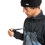 Quiksilver Utility Shell Bib - A black bib with a utility-style design, featuring multiple pockets and buckles on the front.