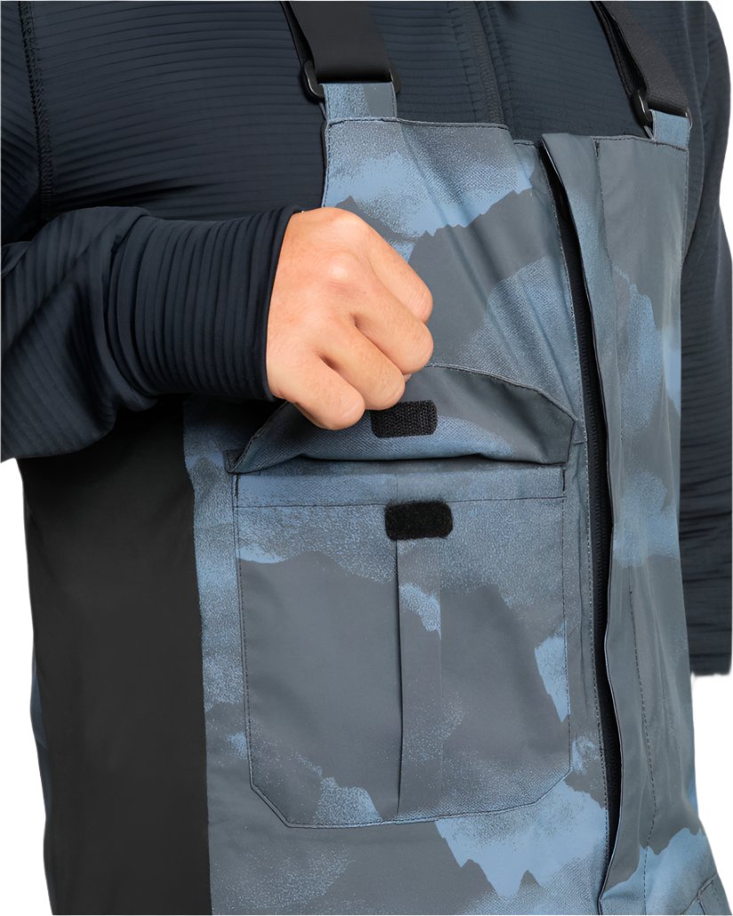 Quiksilver Utility Shell Bib - A pair of gray camouflage snow pants with a bib design and adjustable straps.