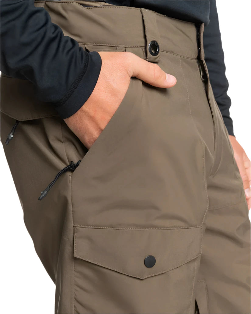 Quiksilver Utility Shell Pant 2025 - A pair of khaki-colored pants with a zippered pocket on the thigh and a button fly.