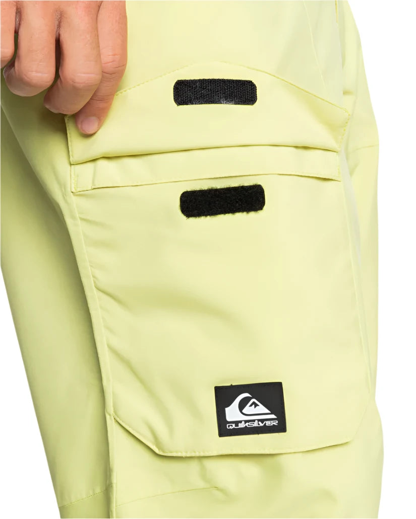 Quiksilver Utility Shell Pant 2025 - A pair of khaki-colored pants with two black Velcro straps on the waistband.