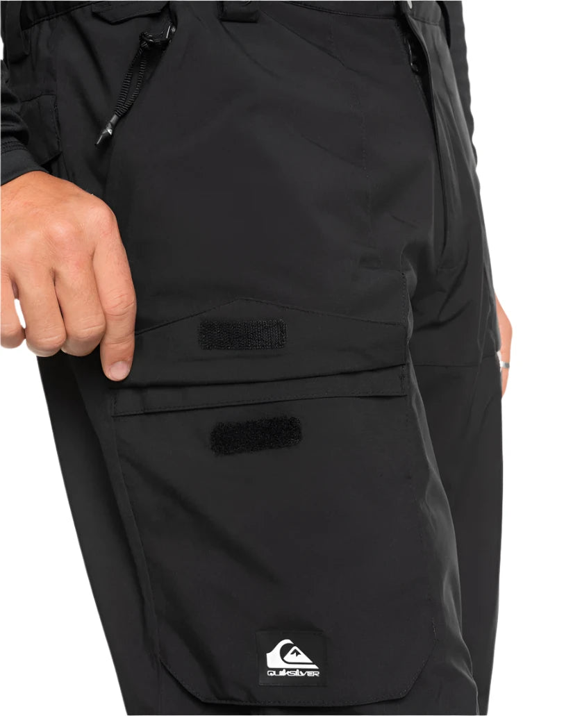 Quiksilver Utility Shell Pant 2025 - Black pants with a zippered pocket on the thigh and adjustable Velcro straps at the waist.