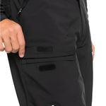 Quiksilver Utility Shell Pant 2025 - Black pants with a zippered pocket on the thigh and adjustable Velcro straps at the waist.
