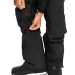 Quiksilver Utility Shell Pant 2025 - Black snow pants with a zippered pocket on the thigh and adjustable Velcro straps at the waist.