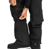 Quiksilver Utility Shell Pant 2025 - Black snow pants with a zippered pocket on the thigh and adjustable Velcro straps at the waist.