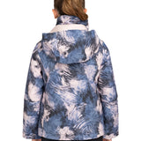 Roxy Girls' Jetty Insulated Jacket 2025 - A blue and white abstract patterned jacket with a hood, worn by a model facing away from the camera.