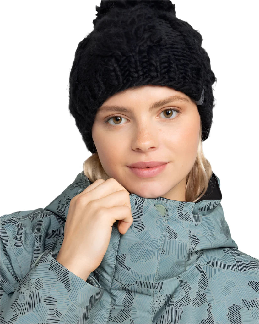Roxy Women's Winter Beanie 2025 - A black beanie with a small gray tag on the side.