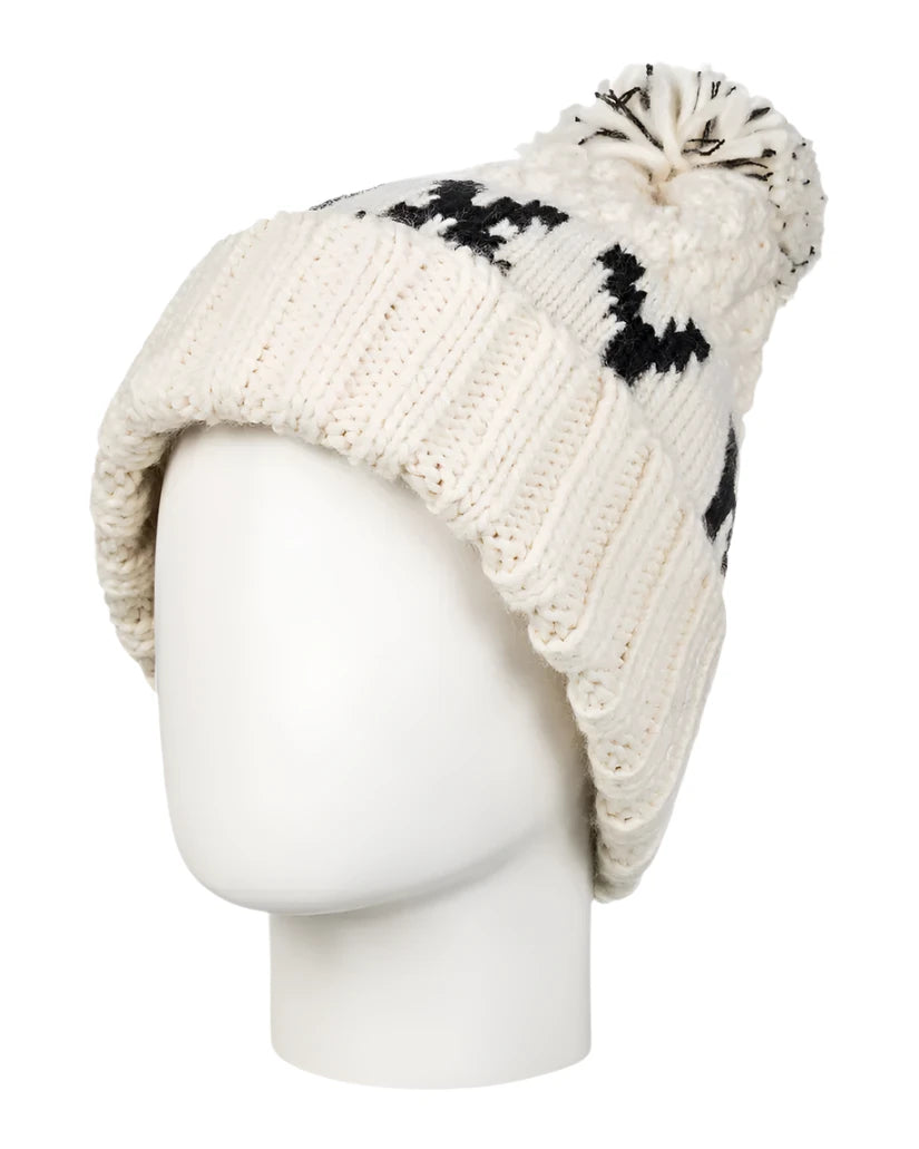 Roxy Women's Tonic Beanie 2025 - A cream-colored beanie with a black geometric pattern on top and a matching pom-pom at the end.