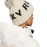 Roxy Women's Tonic Beanie 2025 - A cream-colored beanie with a black "ROXY" logo on the front.