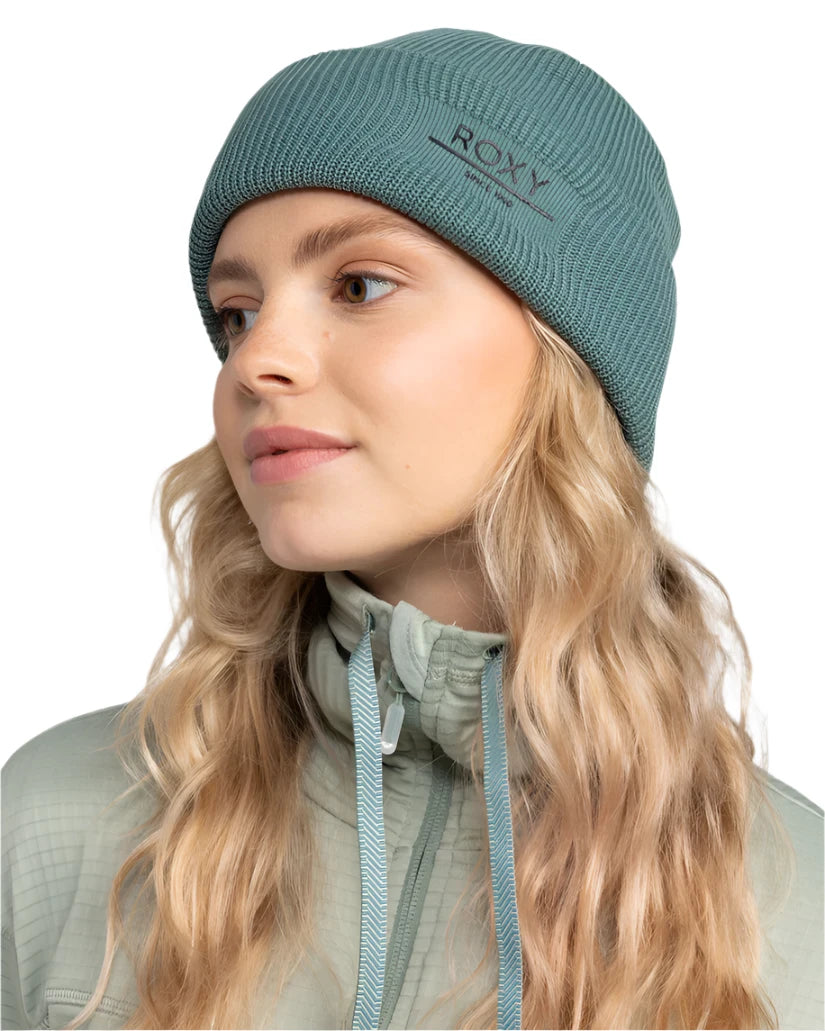 Roxy Women's Folker Beanie 2025 - A light blue beanie with a ribbed texture and "ROXY" logo embroidered on the front.