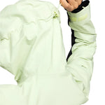 Roxy Women's Gore-Tex Stretch Purelines Jacket 2025 - A light green jacket with a hood, featuring a drawstring at the waist and two zippered pockets on the front.