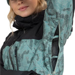 Roxy Women's Stated Insulated Jacket 2025 - A black and teal jacket with a geometric pattern, featuring a zippered front and hood.