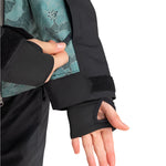 Roxy Women's Stated Insulated Jacket 2025 - A woman's black insulated jacket with a teal patterned lining visible inside the left sleeve cuff.