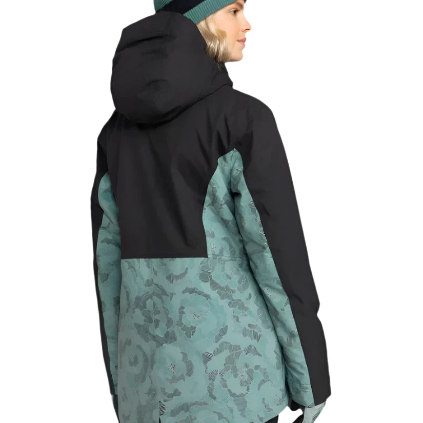 Roxy Women's Stated Insulated Jacket 2025 - A black and teal floral patterned jacket with a hood, worn by a model facing left.