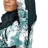 Roxy Women's Jetty 3 In 1 Jacket - A white and teal floral patterned jacket with a hood, black zipper, and black drawstring at the waist.
