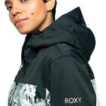 Roxy Women's Jetty 3 In 1 Jacket 2025 - A black jacket with a white and green abstract pattern on the lower portion of the sleeve.