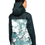 Roxy Women's Jetty 3 In 1 Jacket - A dark green jacket with a white and light blue floral pattern on the back, featuring a hood and zippered pockets.